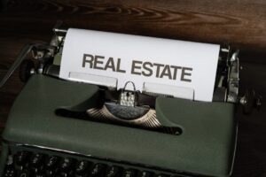 Vintage typewriter with real estate document - Photo by Unsplash