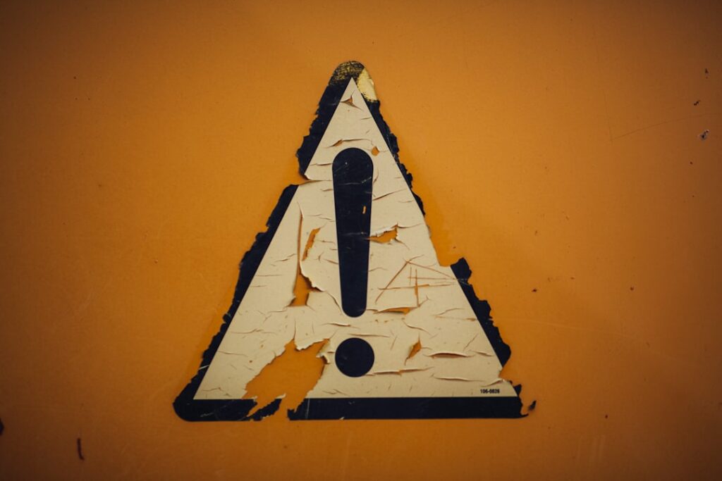 Warning caution sign representing contract risks