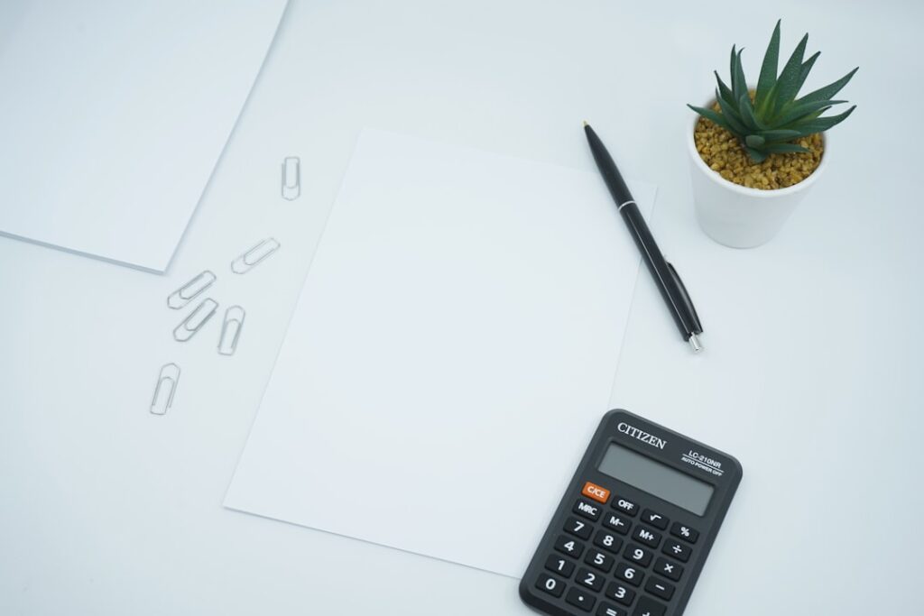 Calculator and financial documents for ITBI tax calculations