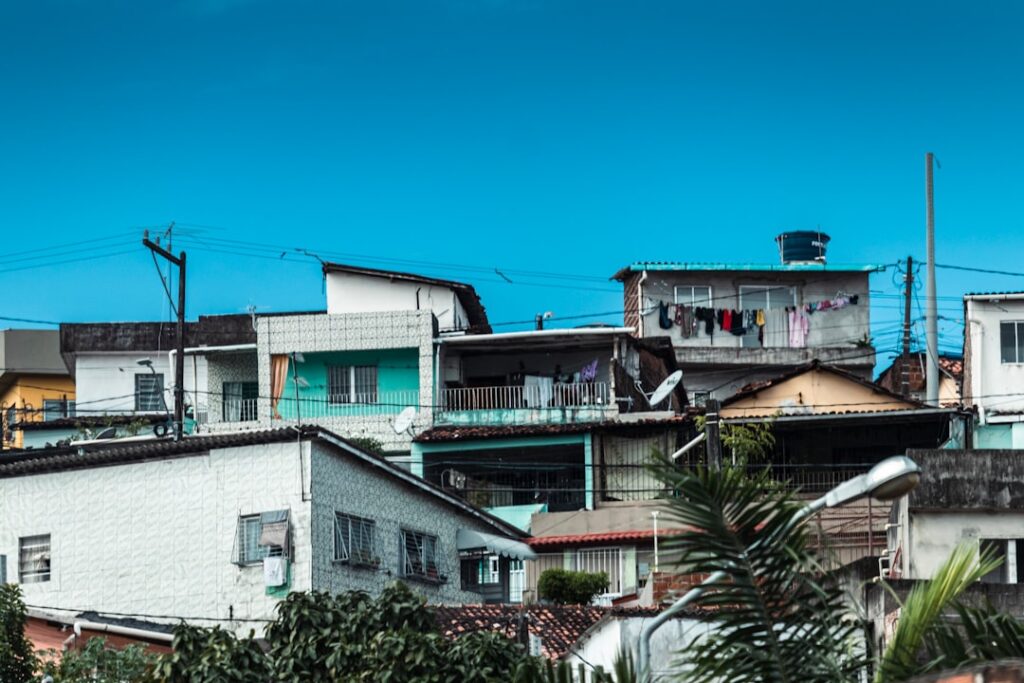 Mixed residential neighborhood in Brazil showing various types of houses and buildings representing property diversity and potential title issues