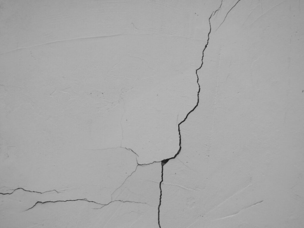 Wall cracks representing hidden property defects