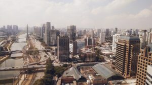 São Paulo skyline from Morumbi neighborhood, representing the urban landscape where real estate lawyers practice. Photo by Daniel Santos on Unsplash