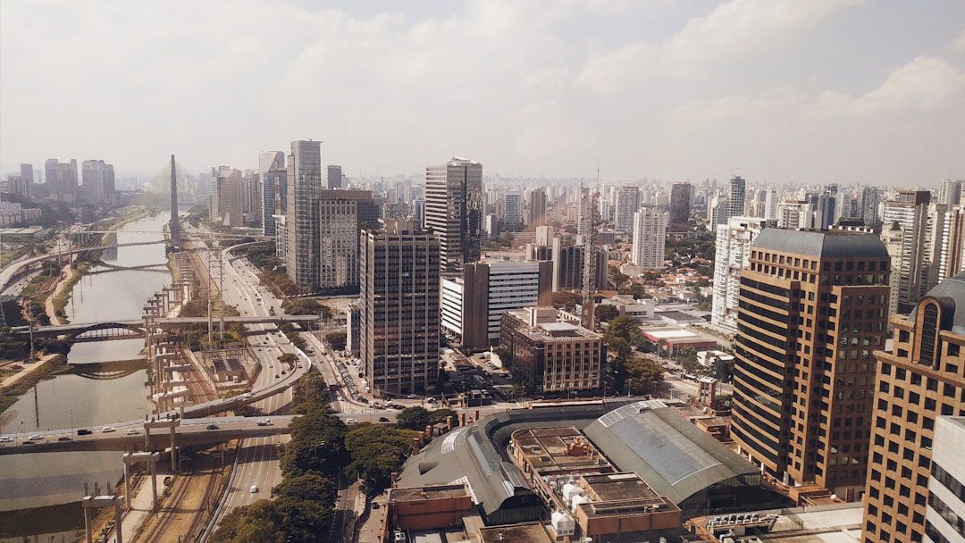 São Paulo skyline from Morumbi neighborhood, representing the urban landscape where real estate lawyers practice. Photo by Daniel Santos on Unsplash