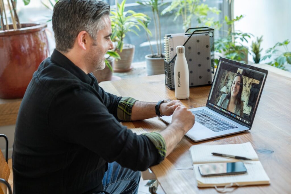 Professional lawyer conducting remote video consultation for real estate clients in São Paulo